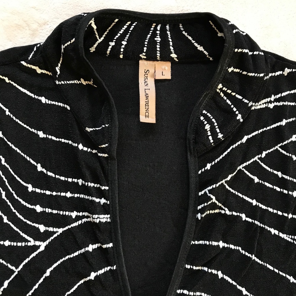 Black top with white design